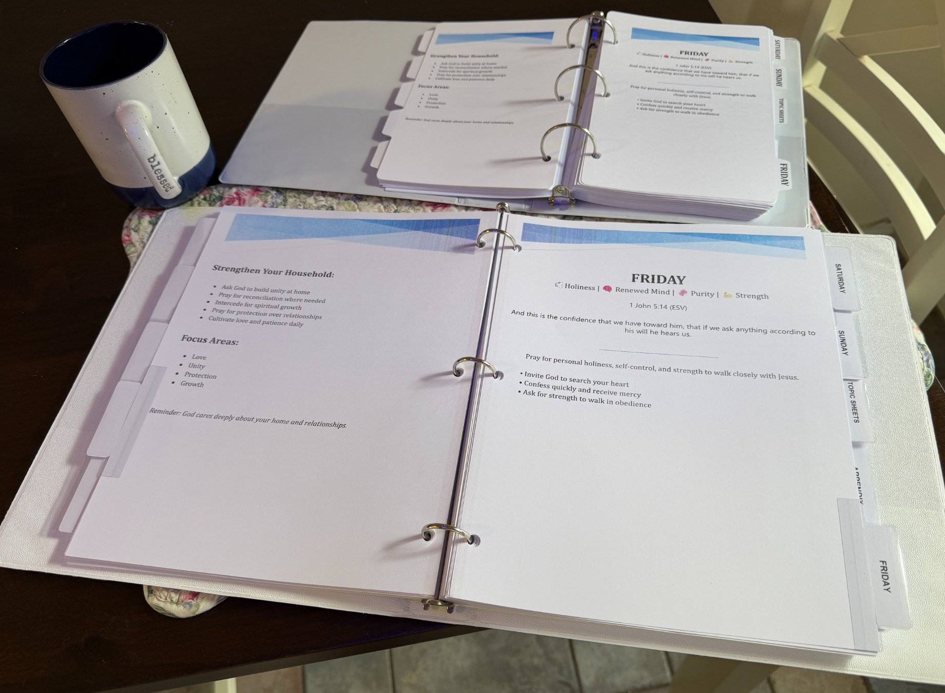 Open Personal Prayer Journal showing daily and weekly divider tabs